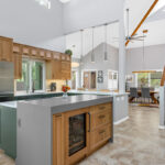 Light brown and painted gray kitchen
