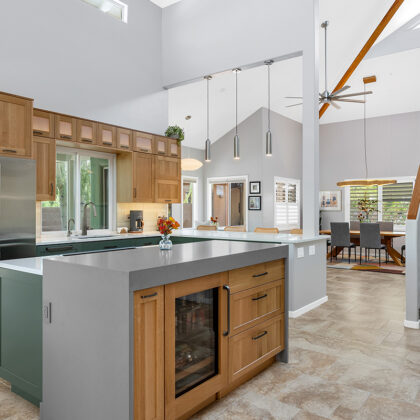 Light brown and painted gray kitchen