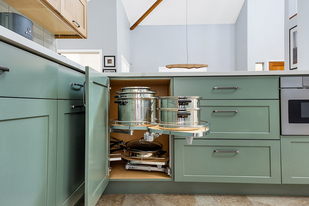 Light brown and painted gray kitchen
