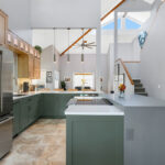 Light brown and painted gray kitchen