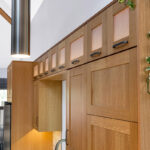 Light brown and painted gray kitchen