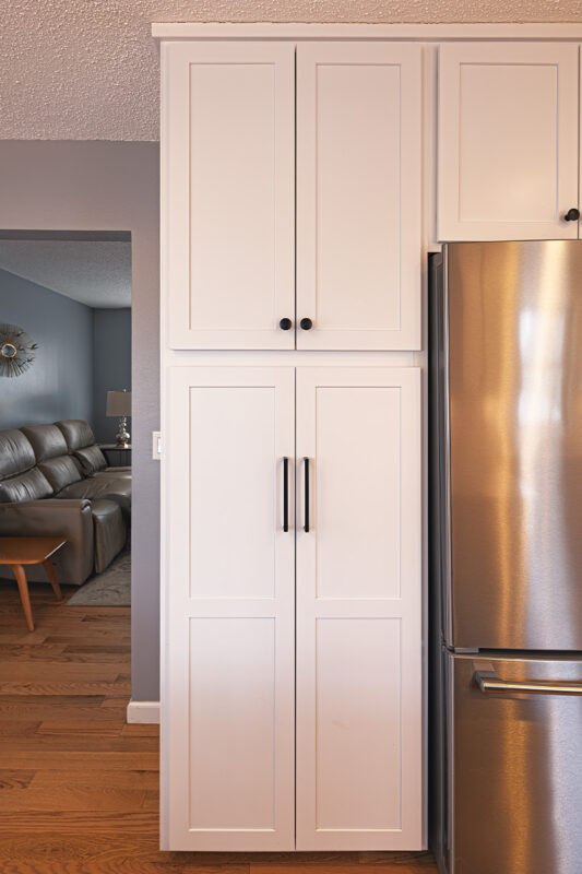 White painted utility cabinet