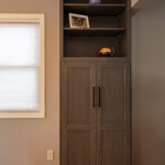 Gray stained utility cabinet