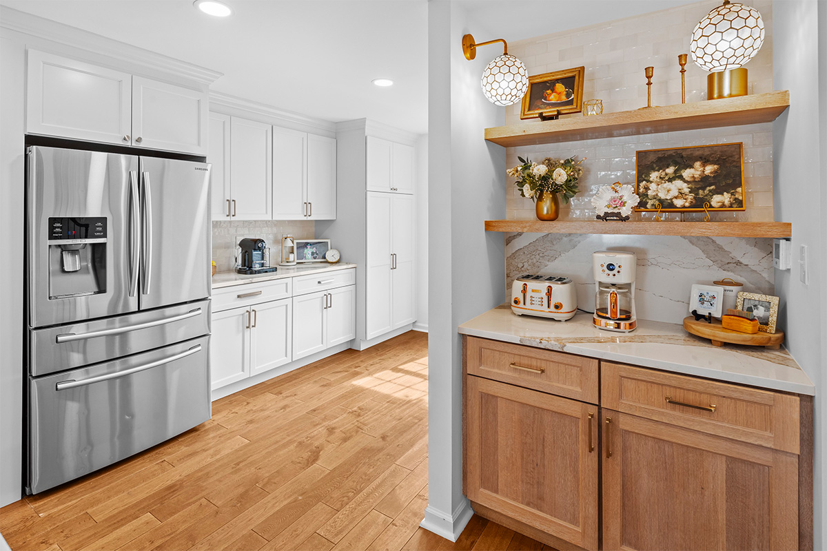 Brown stained bar cabinets with floating shelves.