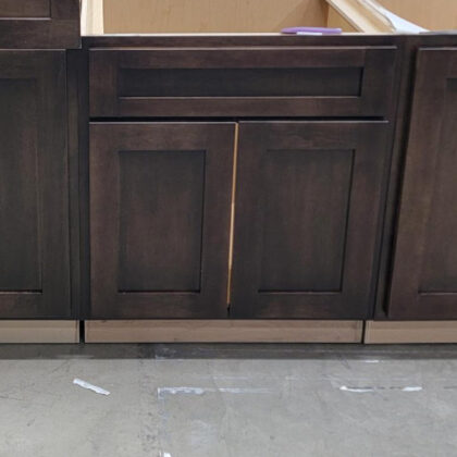 base cabinet with rich Kona stain on maple