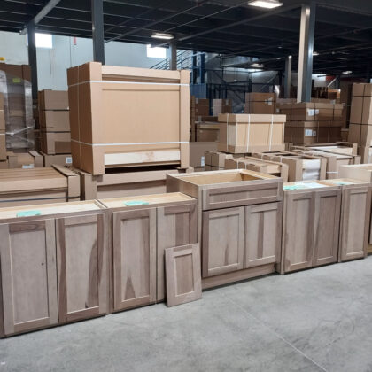 Misc. wall and base cabinets in a warehouse in hickory and light washed Sparrow stain.