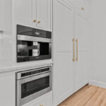 White kitchen perimeter cabinets