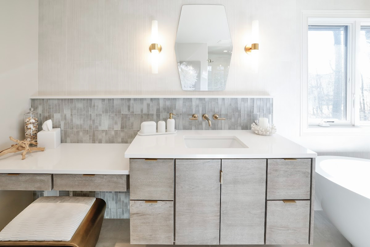 Large master bathroom with 2 vanity areas with light Montana stain, powder desk.