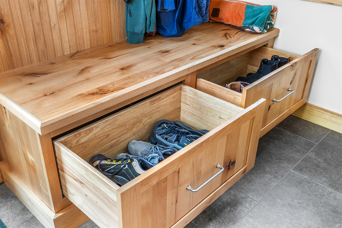 Rustic Alder mudroom seating with drawers under the wood top.