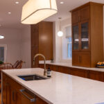 Cherry kitchen cabinets with a red Sienna stain. The layout is only one wall cabinet (intalled on countertop) installed.