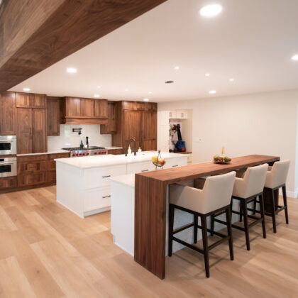 Walnut kitchen cabinets with white double islands