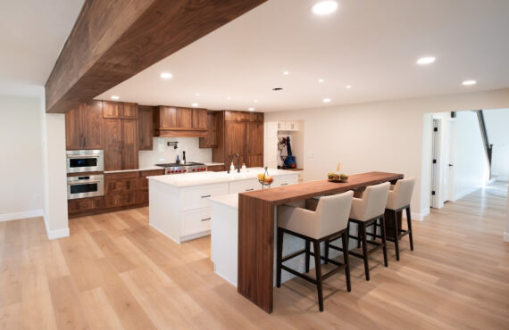 Walnut kitchen cabinets with white double islands