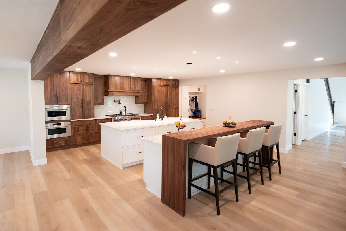 Walnut kitchen cabinets with white double islands