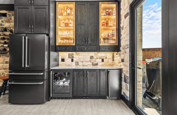 Kitchen cabinets with dark Midnight stain on Rustic Alder.
