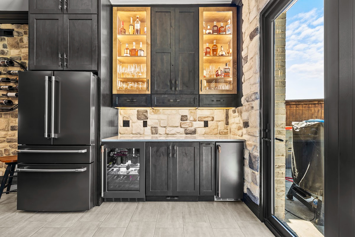 Kitchen cabinets with dark Midnight stain on Rustic Alder.