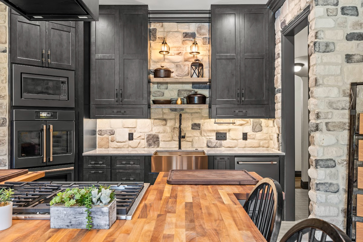 Kitchen cabinets with dark Midnight stain on Rustic Alder.