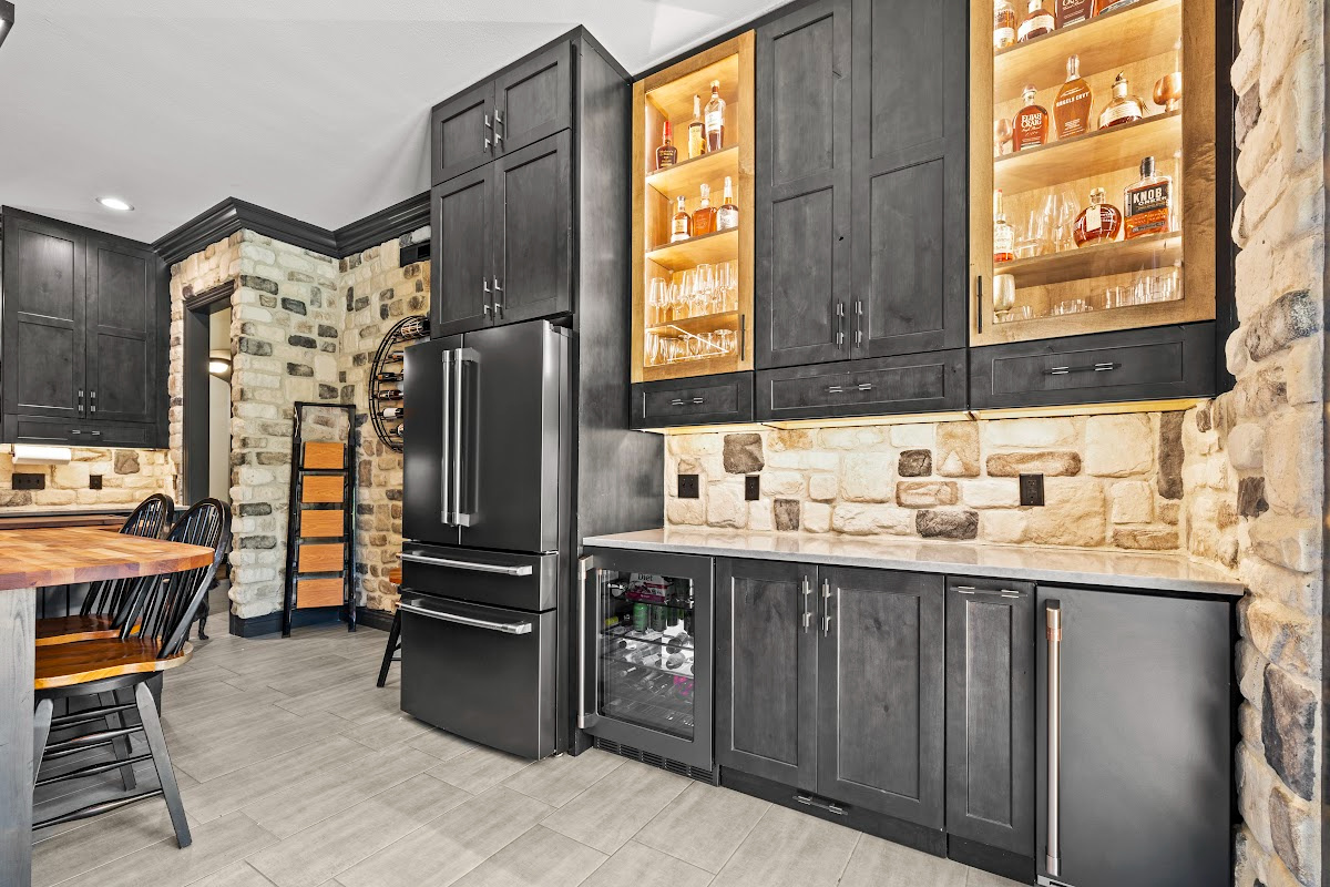 Kitchen cabinets with dark Midnight stain on Rustic Alder.