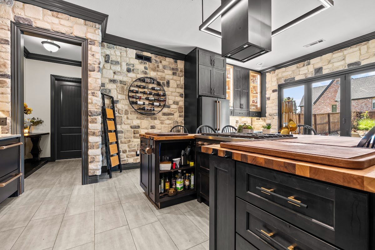 Kitchen cabinets with dark Midnight stain on Rustic Alder.