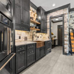 Kitchen cabinets with dark Midnight stain on Rustic Alder.