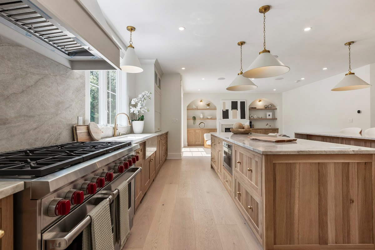 White and light brown kitchen cabinets.