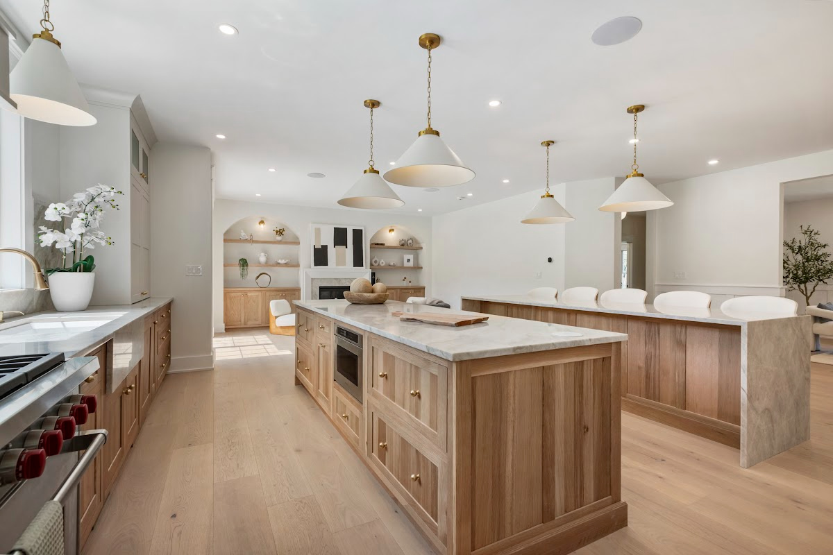 White and light brown kitchen cabinets.