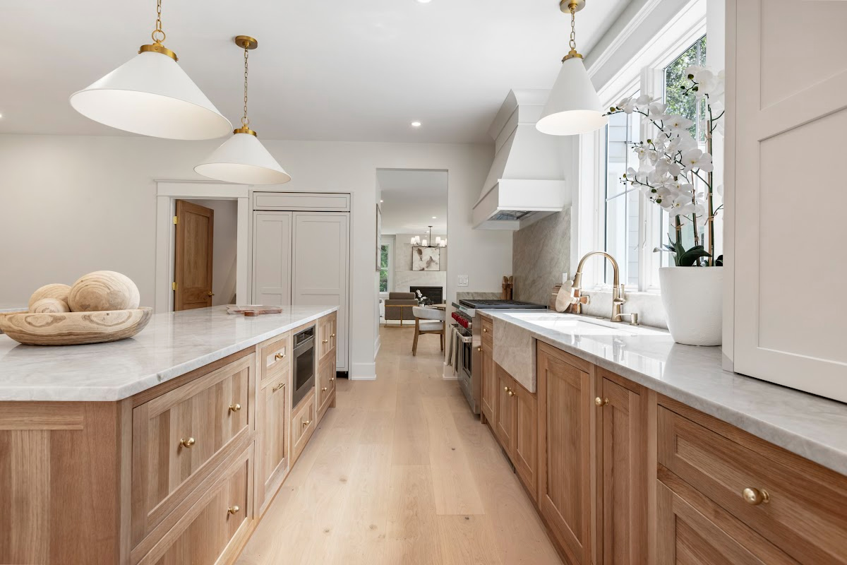 White and light brown kitchen cabinets.