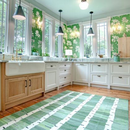White kitchen cabinets with natural rift white oak apron sink.