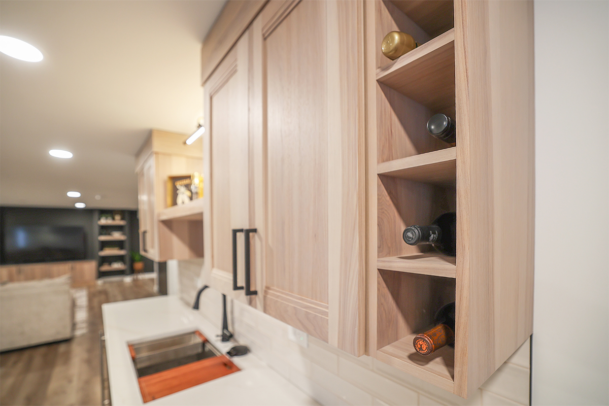 Contemporary kitchen with cabinets in light stain.