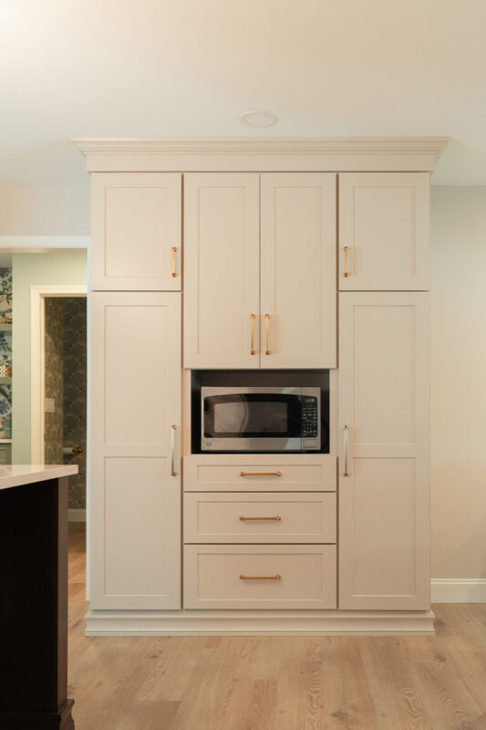 Light Mocha painted perimeter kitchen cabinets.