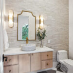 Floating bathroom vanity in Vita stain on Rift White Oak.
