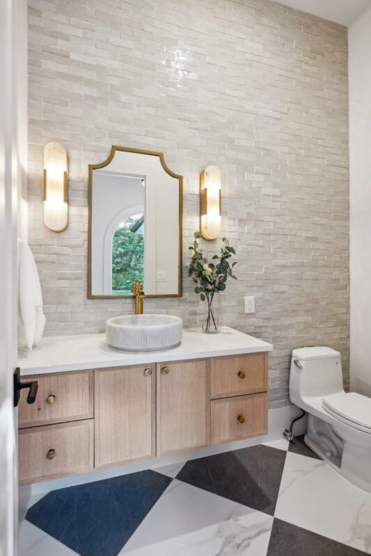 Floating bathroom vanity in Vita stain on Rift White Oak.
