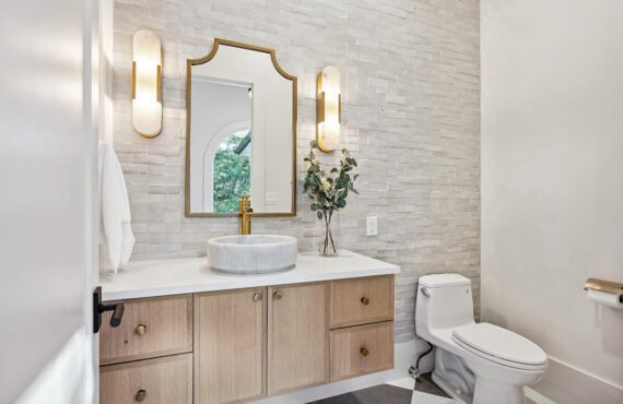 Floating bathroom vanity in Vita stain on Rift White Oak.