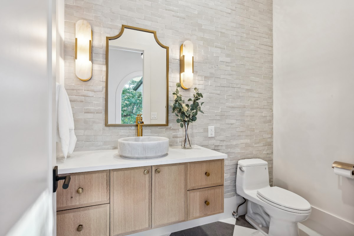 Floating bathroom vanity in Vita stain on Rift White Oak.