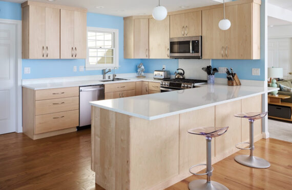 Modern Mid-Century kitchen with slab doors in maple natural