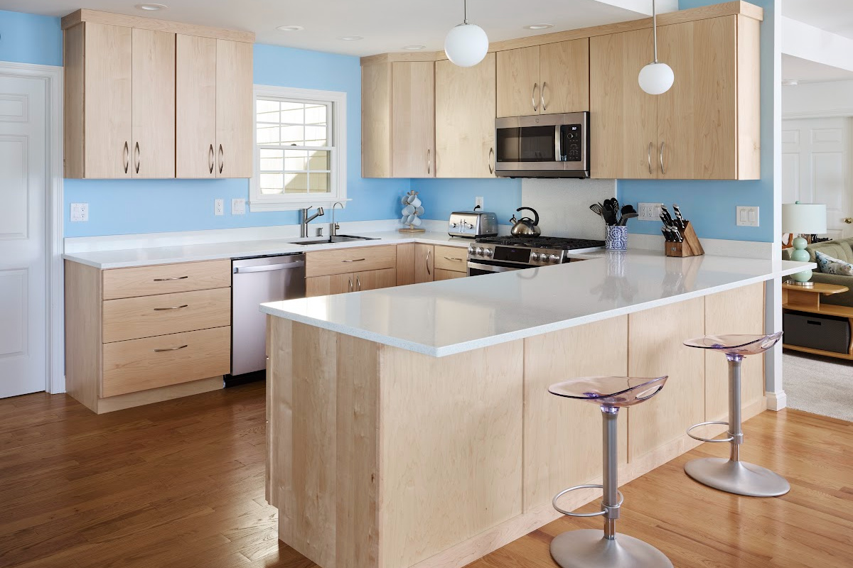 Modern Mid-Century kitchen with slab doors in maple natural