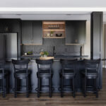 Painted black basement bar cabinets