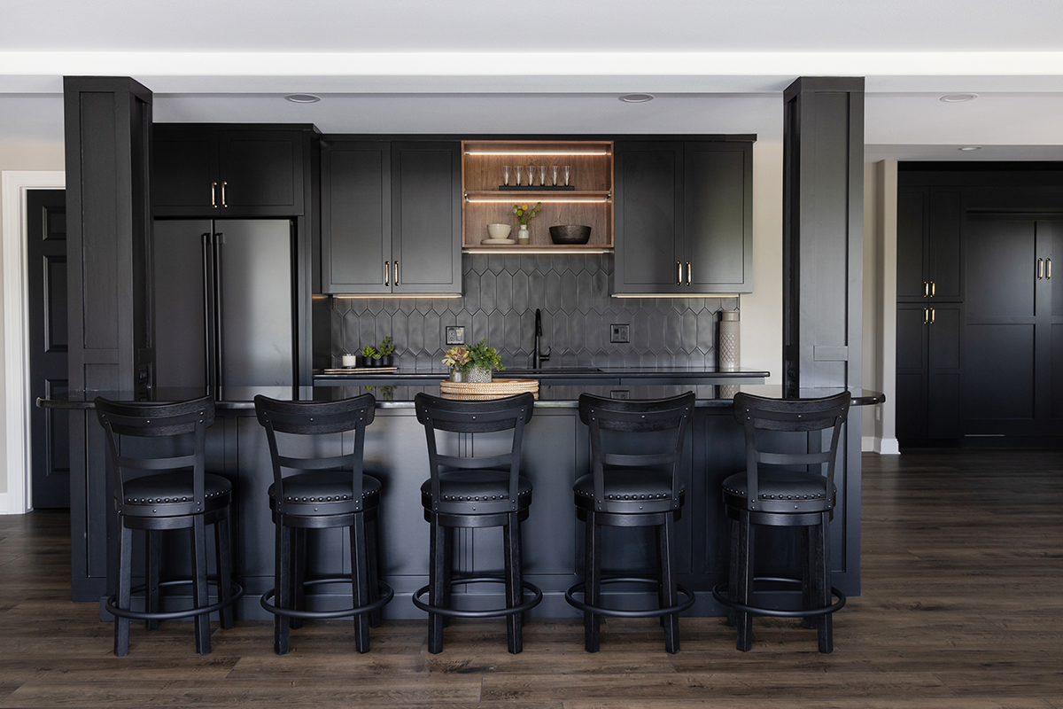 Painted black basement bar cabinets