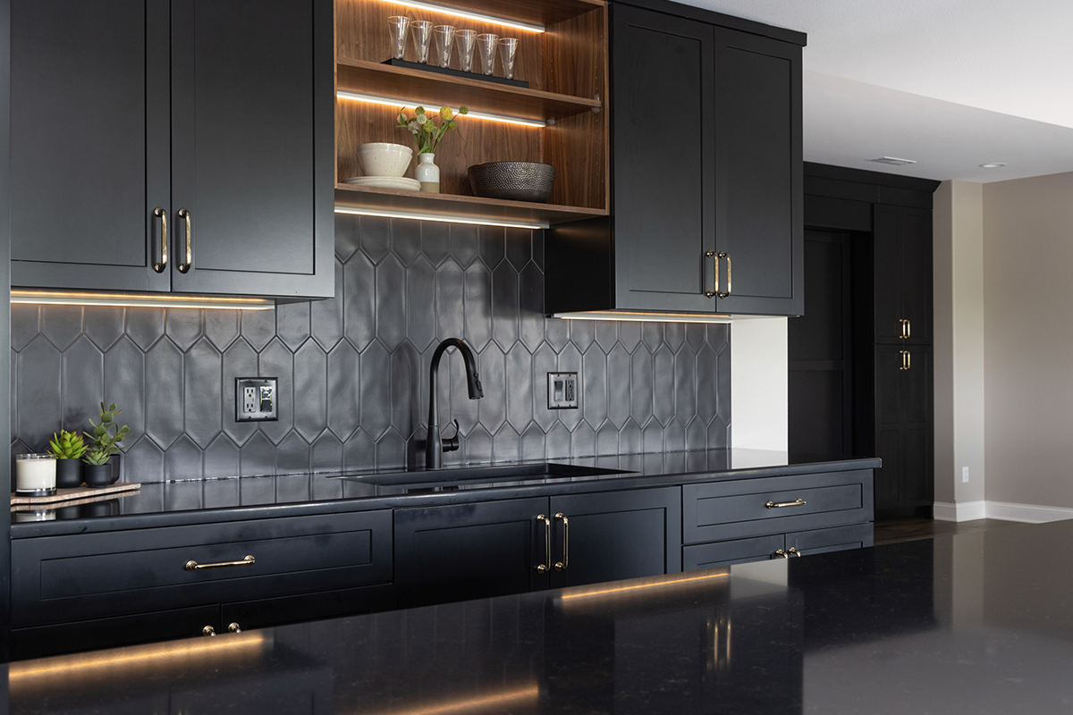 Painted black basement bar cabinets