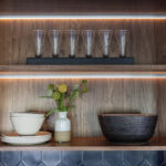 Painted black basement bar cabinets