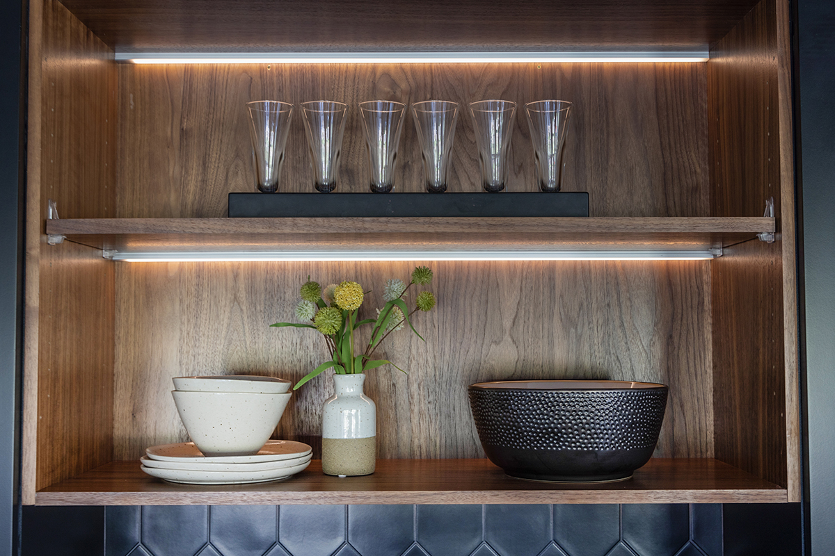 Painted black basement bar cabinets