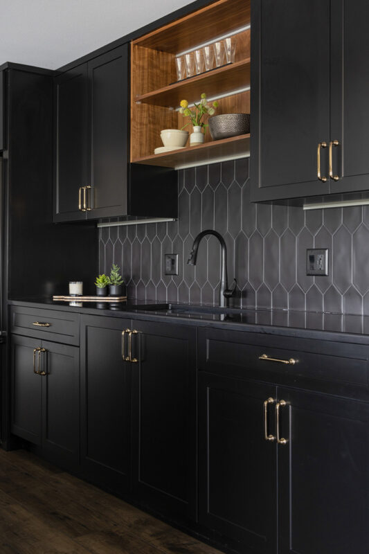 Painted black basement bar cabinets