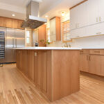 Painted and stained kitchen cabinets.
