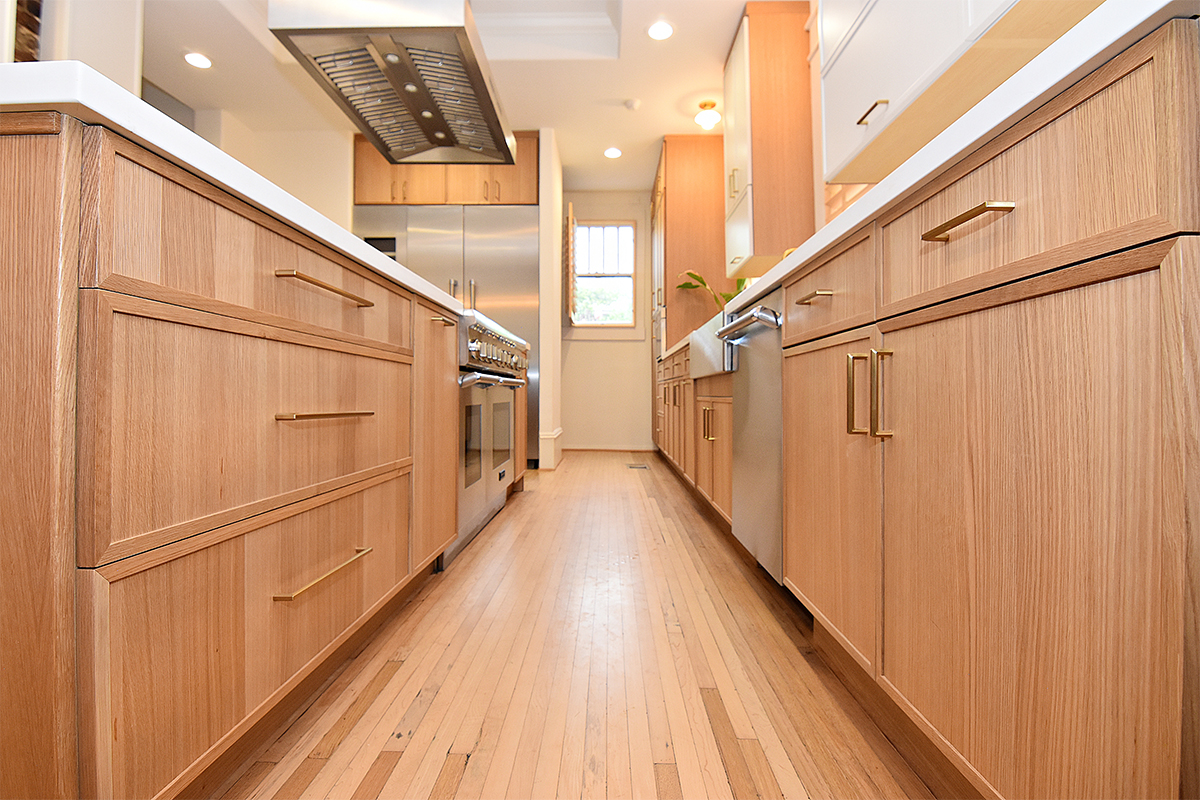 Painted and stained kitchen cabinets.