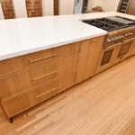 Painted and stained kitchen cabinets.