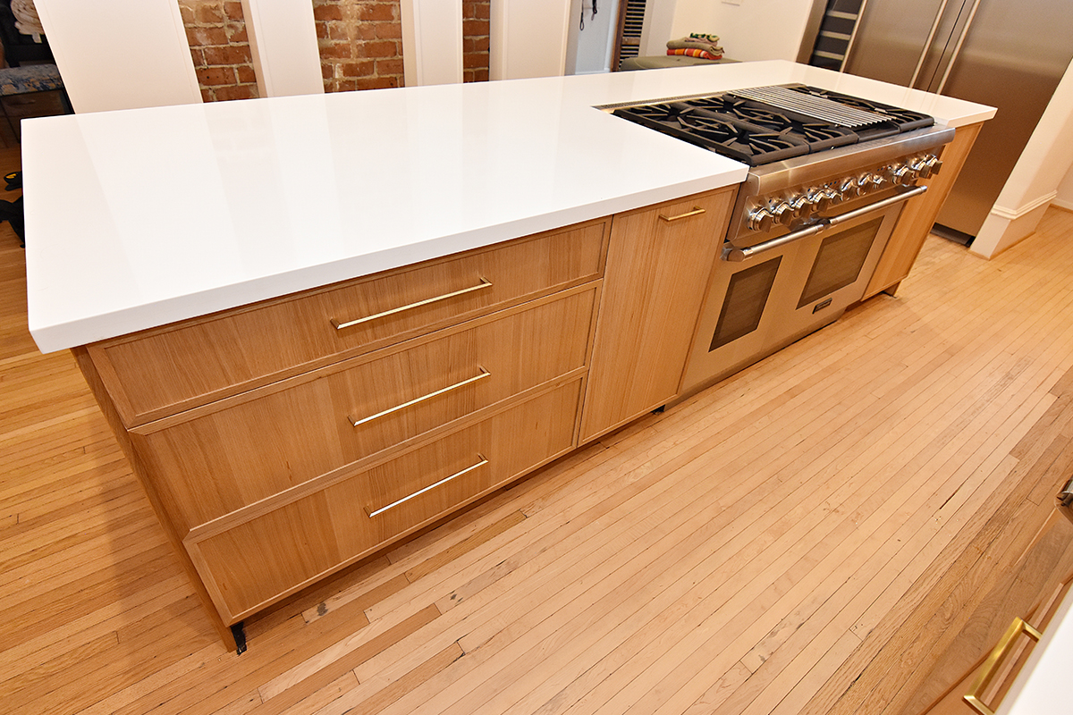 Painted and stained kitchen cabinets.