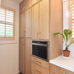 Painted and stained kitchen cabinets.