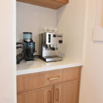 Painted and stained kitchen cabinets.
