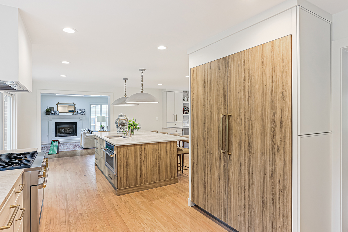Ginger surface island cabinets and fridge panels.