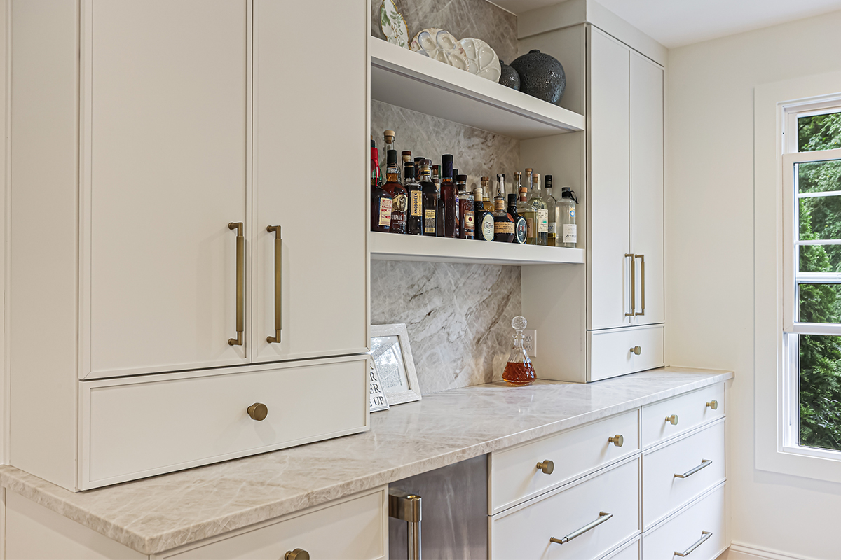 White painted bar cabinets.